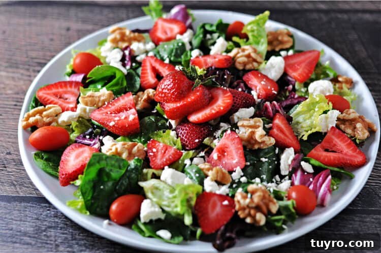 strawberry walnut salad on a plate