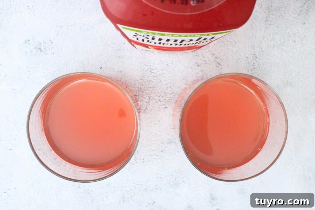 Watermelon Gin Fizz: 3-Ingredient Summer Cocktail Recipe 5 add gin and watermelon juice to rocks glass