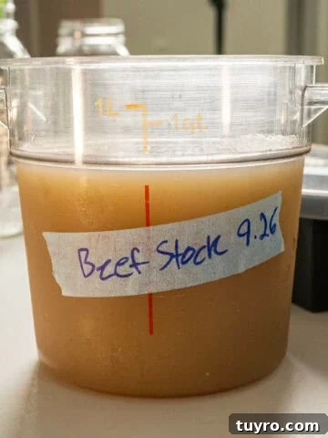 Beef stock in a container.