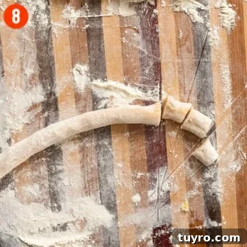 Rolled dough into a long thin rope.
