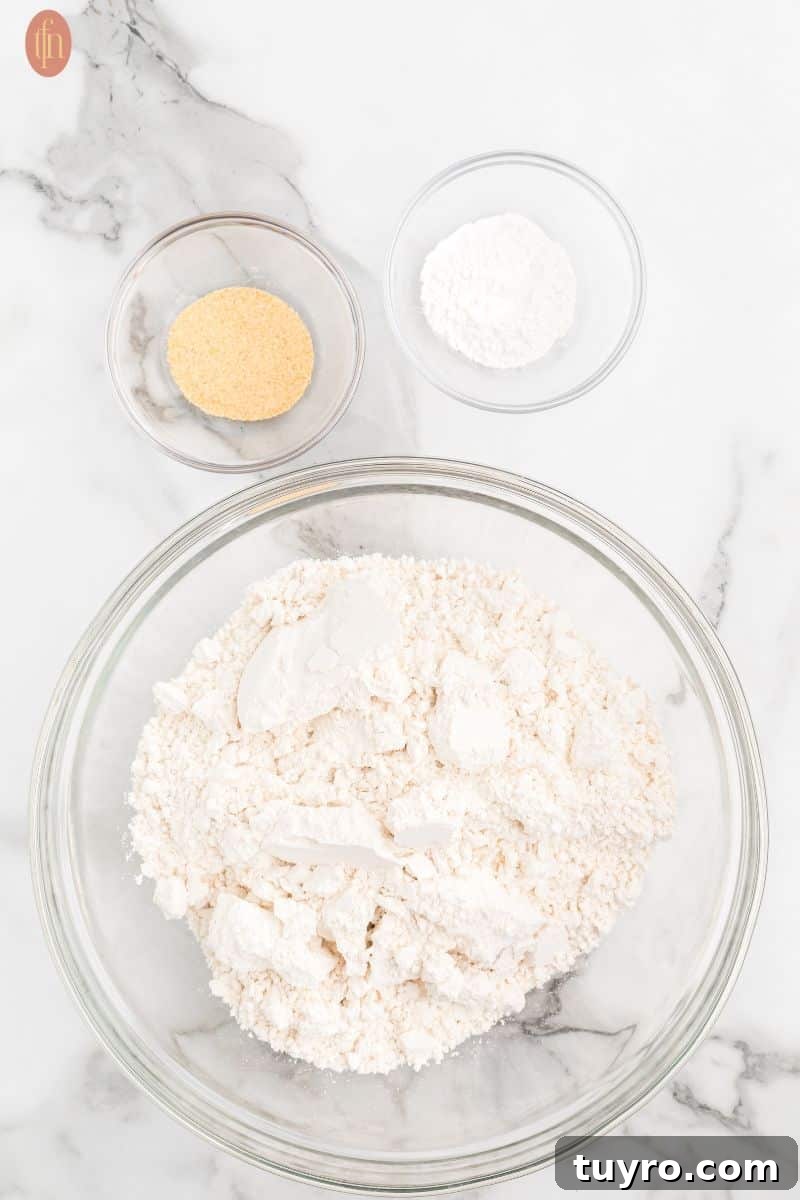 Copycat Cheddar Bay Biscuits Recipe 5 A bowl of flour, baking powder, and garlic powder.