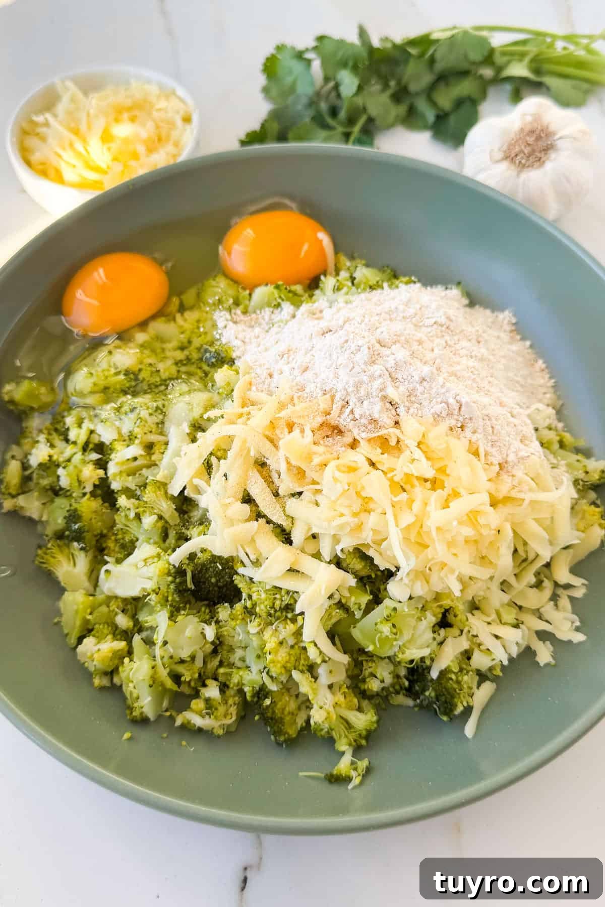 Broccoli Cheddar Waffles Recipe 5 Waffle ingredients in mixing bowl.