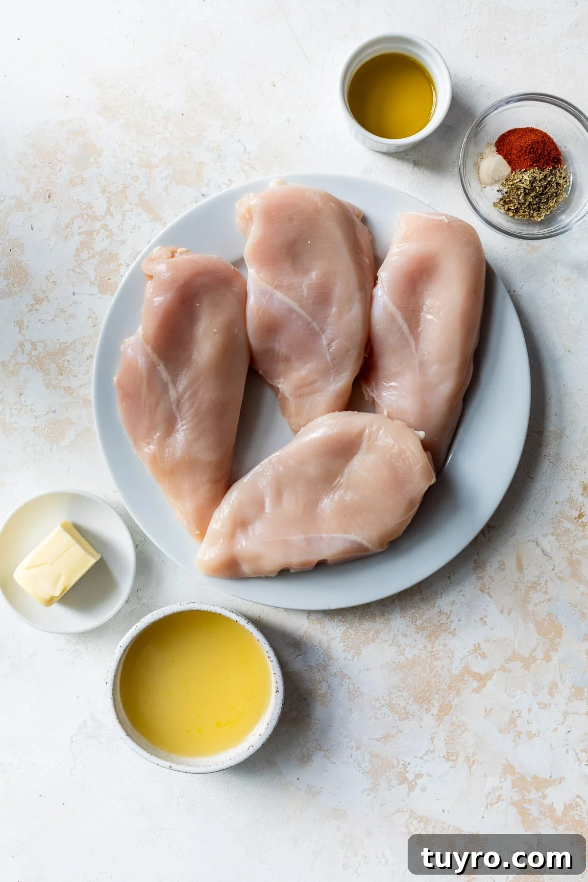 Tender Slow-Cooker Chicken Breast Recipe for Quick Meals 3 ingredients for a Slow Cooker Chicken Breast recipe in individual bowls and plates.