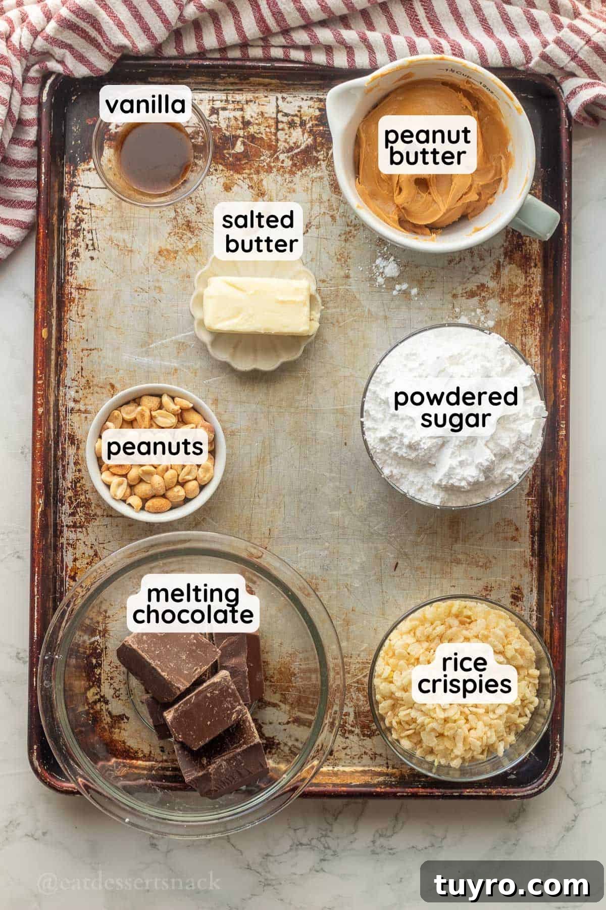 No-Bake Peanut Butter Rice Krispie Balls 3 Labeled ingredients for peanut butter balls on metal tray.