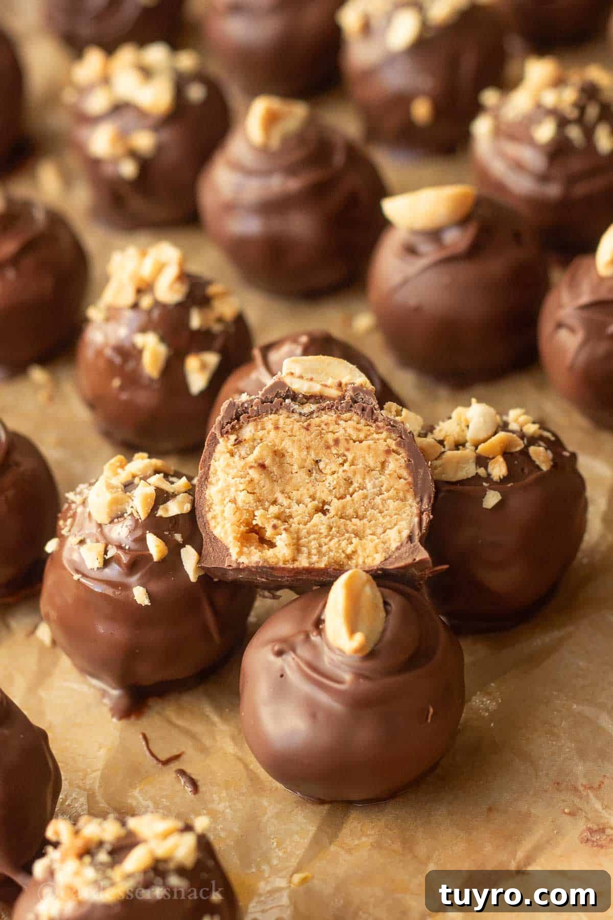 No-Bake Peanut Butter Rice Krispie Balls 10 Halved peanut butter ball.