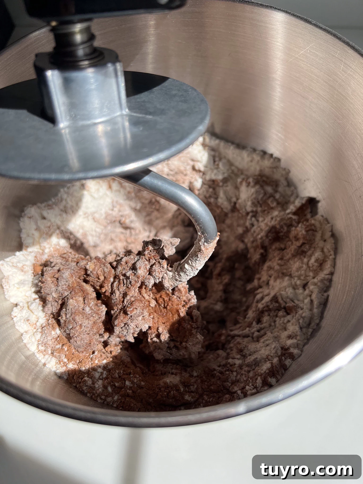Chocolate Swirl Bread Recipe — Soft Homemade Choco Loaf 11 Mixing together the dough in the bowl of a stand mixer.