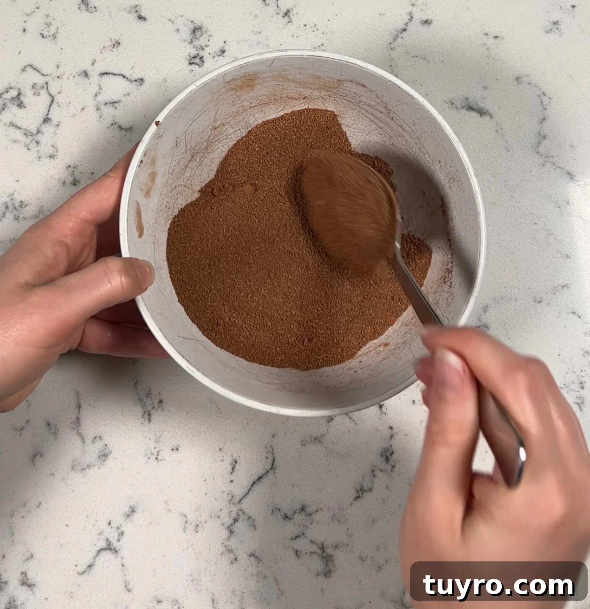 Chocolate Swirl Bread Recipe — Soft Homemade Choco Loaf 15 Mixing together sugar and cocoa powder.
