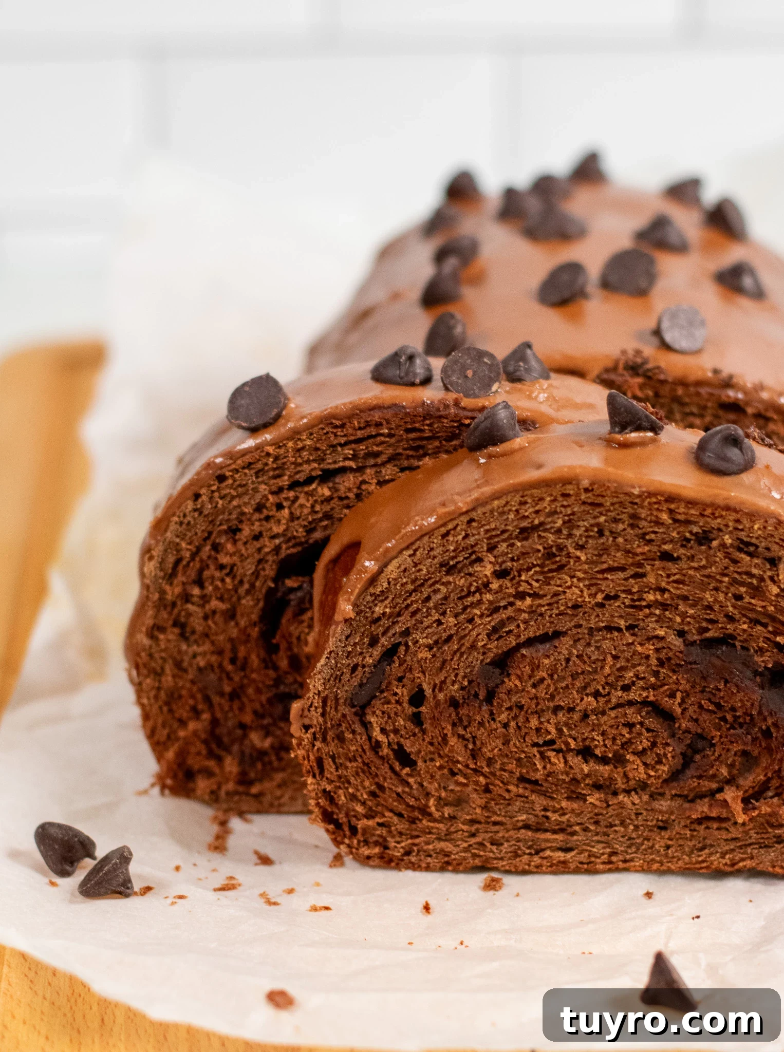 Chocolate Swirl Bread Recipe — Soft Homemade Choco Loaf 4 Slices of chocolate swirl bread.