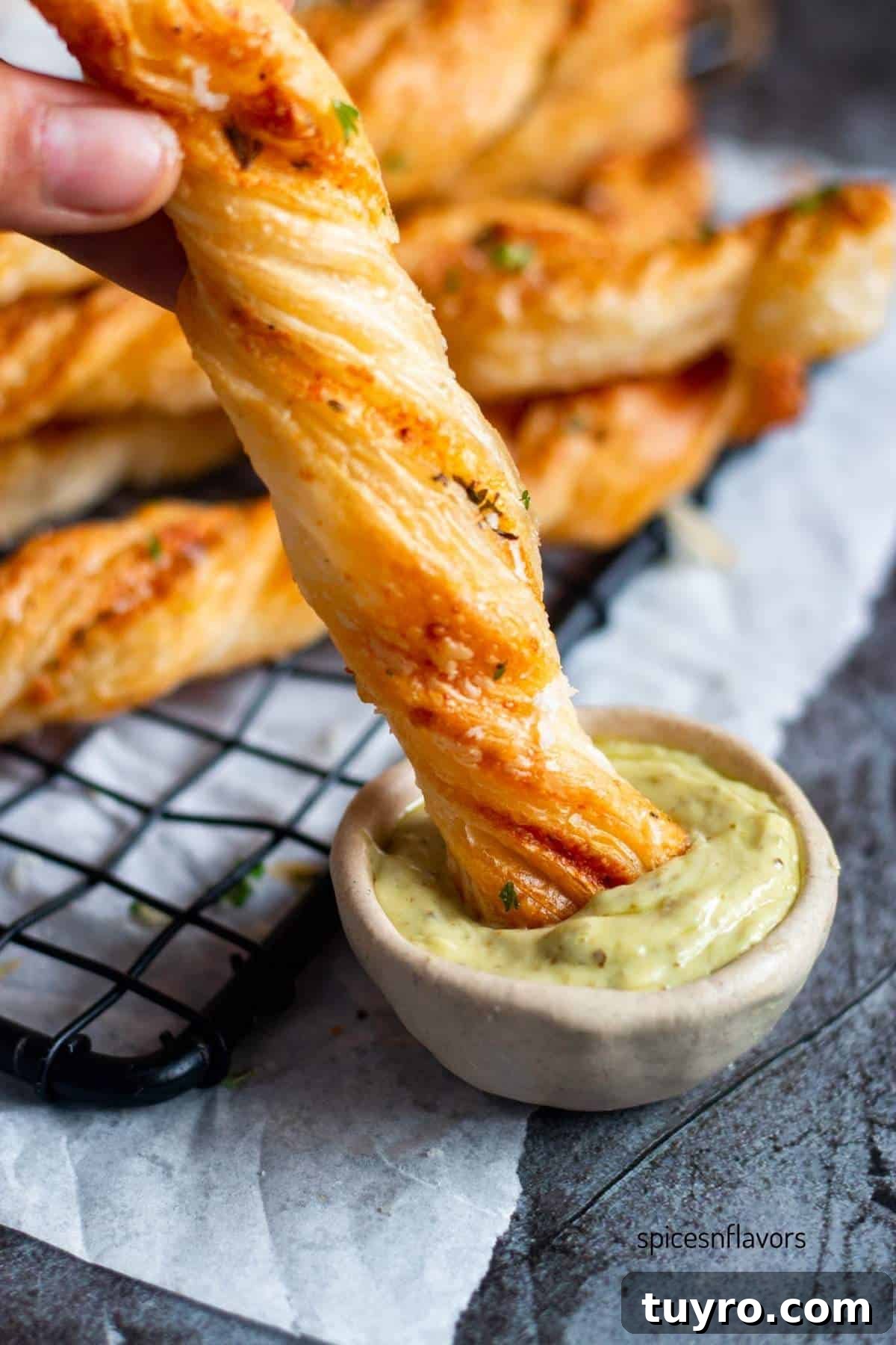 Cheesy Garlic Puff Pastry Twists Recipe for Savory Snacks 7 garlic puff pastry twists dipped in aioli