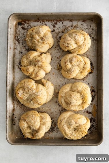 Homemade Parmesan Garlic Knots Recipe 15 Baked knots with butter brushed over the top.