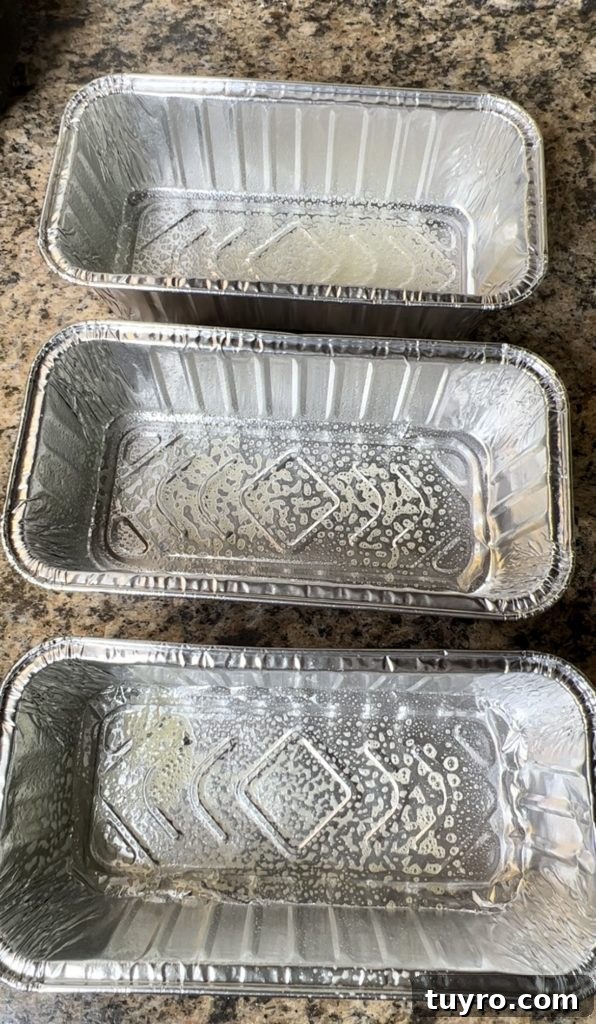 Moist Zucchini Bread Recipe with Cinnamon Streusel 7 Zucchini bread batter in loaf pans