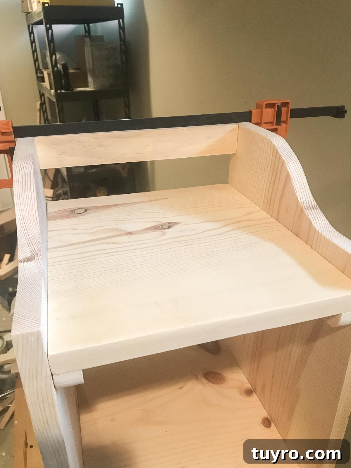 Versatile Bookshelf End Table with Storage and Display Space 9 clamping back side rail to bookshelf