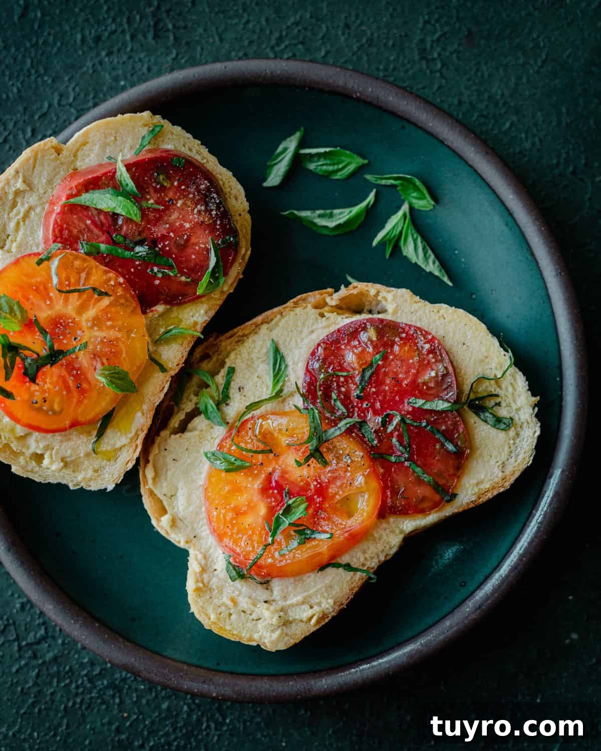 fermented cashew cheese on toast with heirloom tomatoes