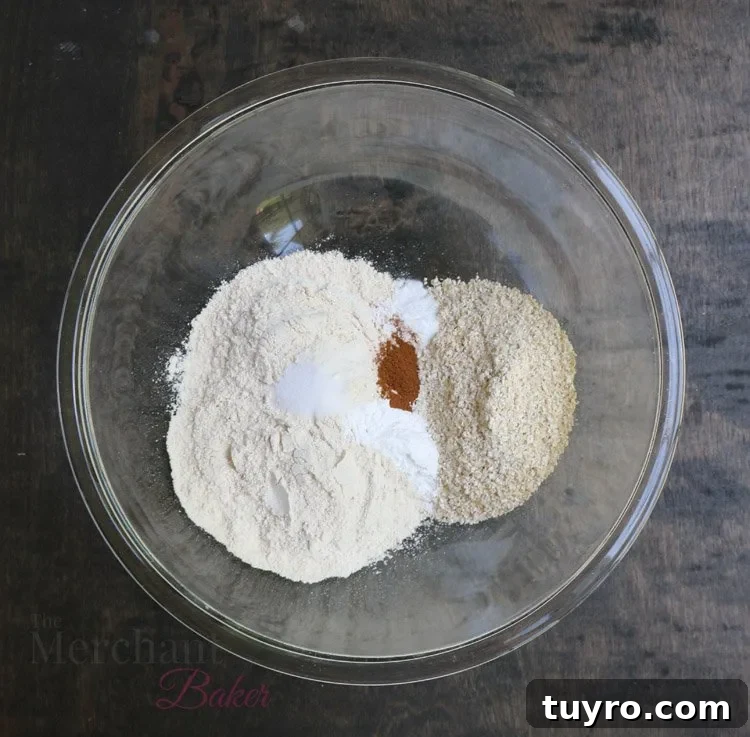 Glass bowl filled with dry pancake ingredients
