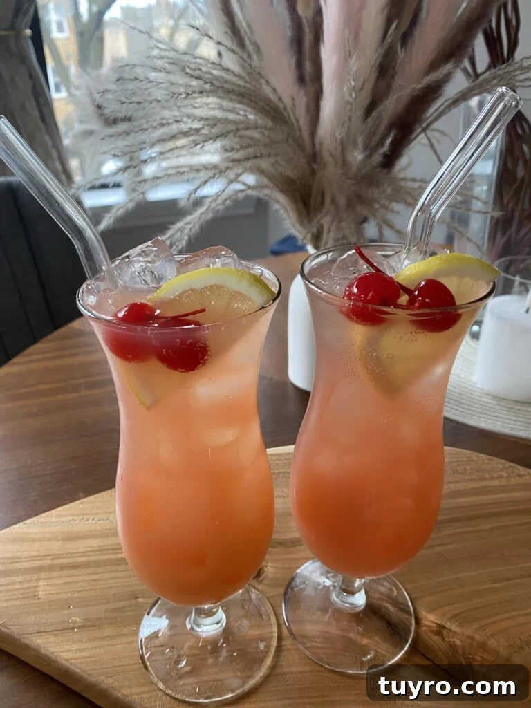 Mardi Gras Hurricane Mocktail Recipe — Festive Non-Alcoholic Drink 2 Two Mardi Gras Hurricane Mocktails