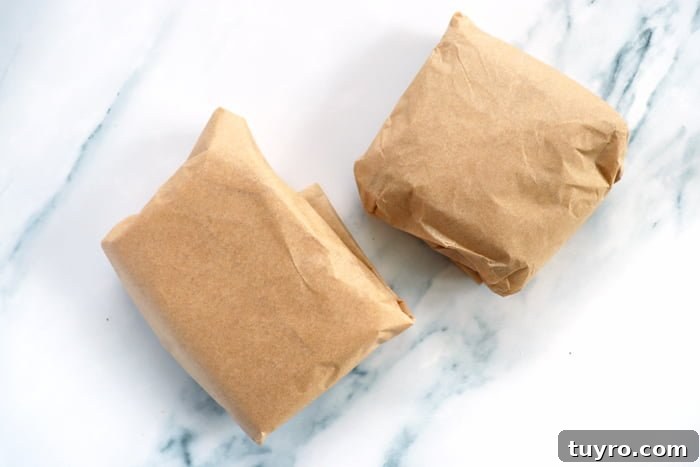 Cold Smoking Cheese: Complete Guide to Safe, Flavorful Results 7 smoked cheddar cheese wrapped in parchment paper