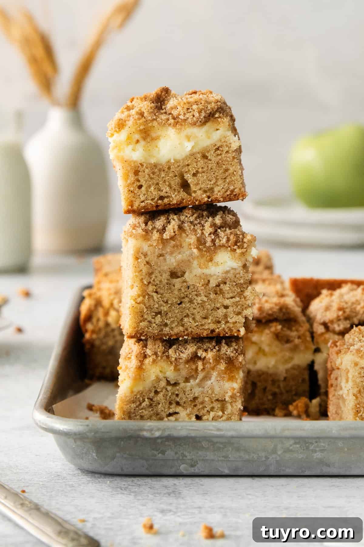Homemade Apple Cream Cheese Coffee Cake Recipe 7 a bunch of food that is in a pan.