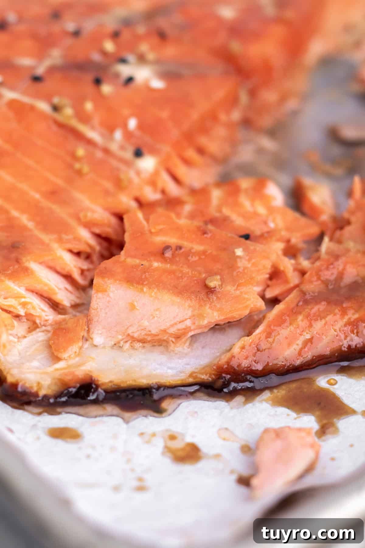 Baked Teriyaki Salmon in 15 Minutes — 2-Ingredient Recipe 6 inside of a cooked piece of salmon.