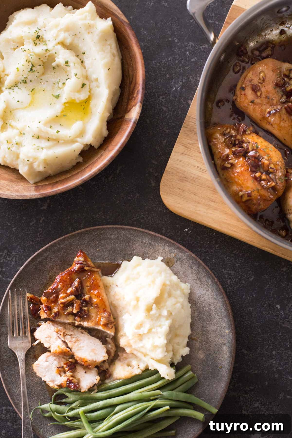 Butter Pecan Chicken Recipe with Crispy Pan-Seared Chicken and Maple Glaze 3 Overhead view of Butter Pecan Chicken dished out onto a plate with a side of mashed potatoes.