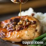 Sweet glaze spooned over Butter Pecan Chicken.