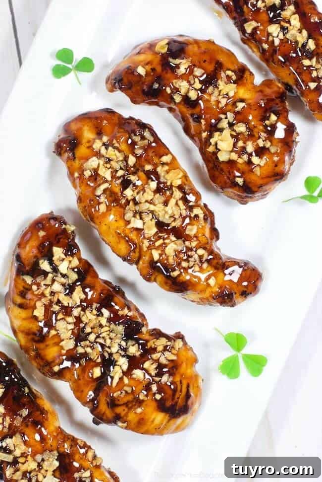 St Patricks Day Appetizers for a Festive Party 11 guinness glazed chicken tenders on a plate.