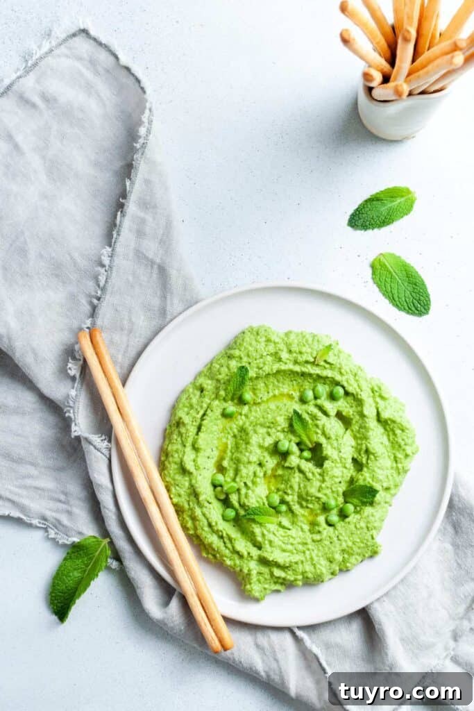 St Patricks Day Appetizers for a Festive Party 9 pea and mint dip on a white plate.
