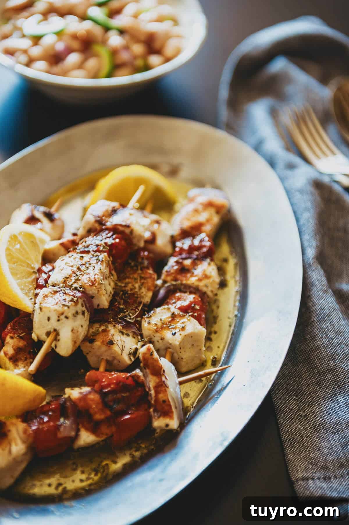 Souvlaki Explained: Your Guide to Greece’s Iconic Street Food 5 an oval plate filled with swordfish souvlaki.