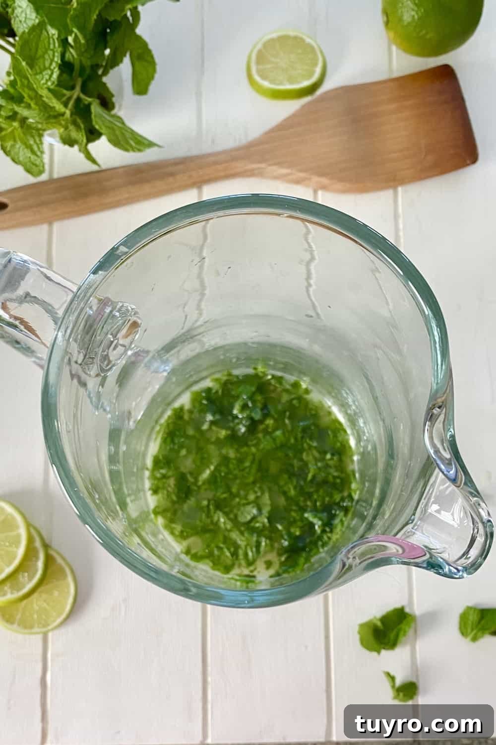 Sparkling Vodka Limeade Cocktail Recipe: Refreshing Citrus Fizz 4 muddled mint leaves in a pitcher