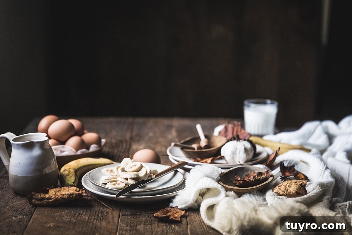 2-Ingredient Banana Pancakes: Egg & Banana Recipe 3 horizontal moody shot of ingredients for egg and banana omelet