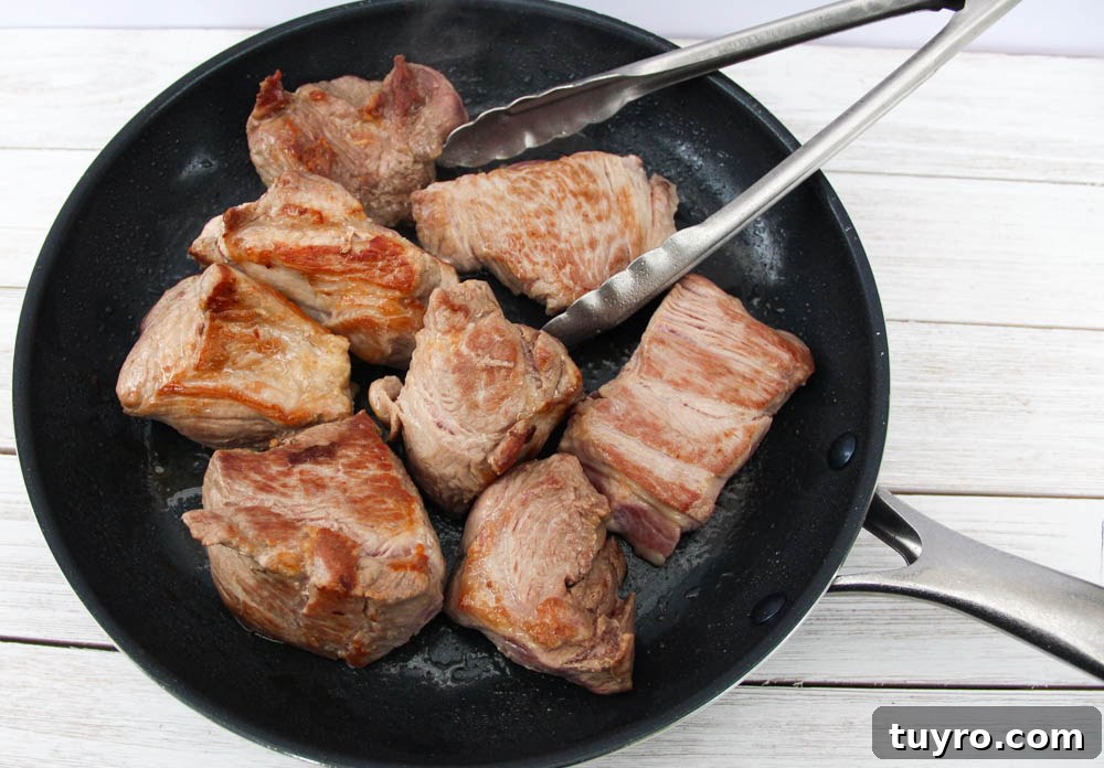 Tender Slow-Cooker Pork Carnitas Recipe for Homemade Tacos 4 Searing carnitas