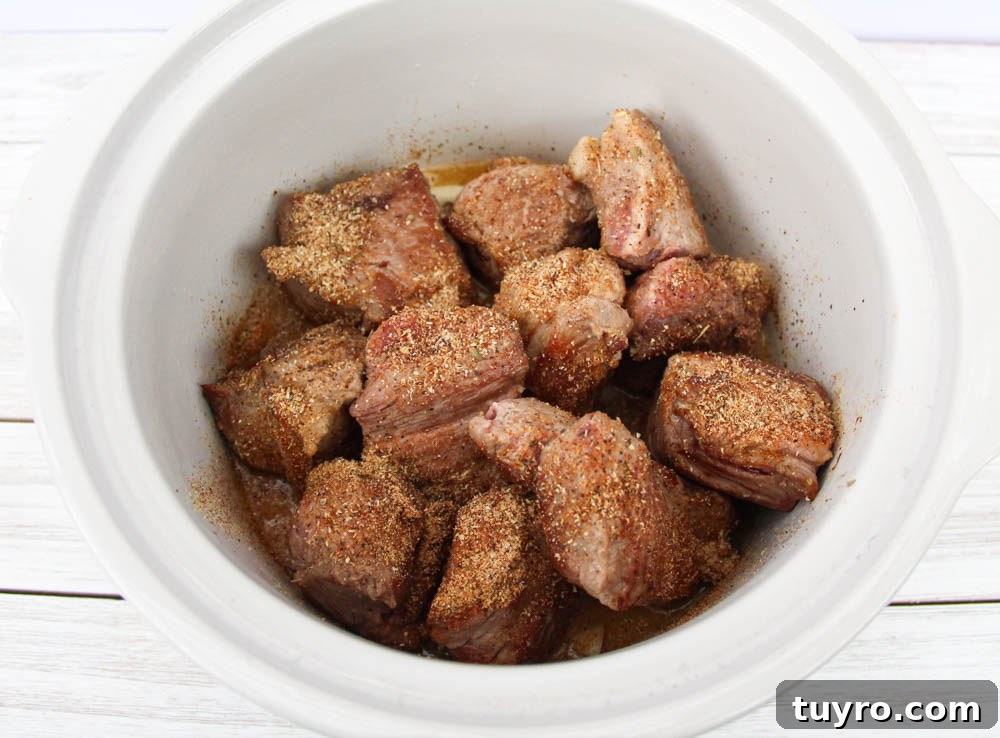 Tender Slow-Cooker Pork Carnitas Recipe for Homemade Tacos 5 Pork in slow cooker