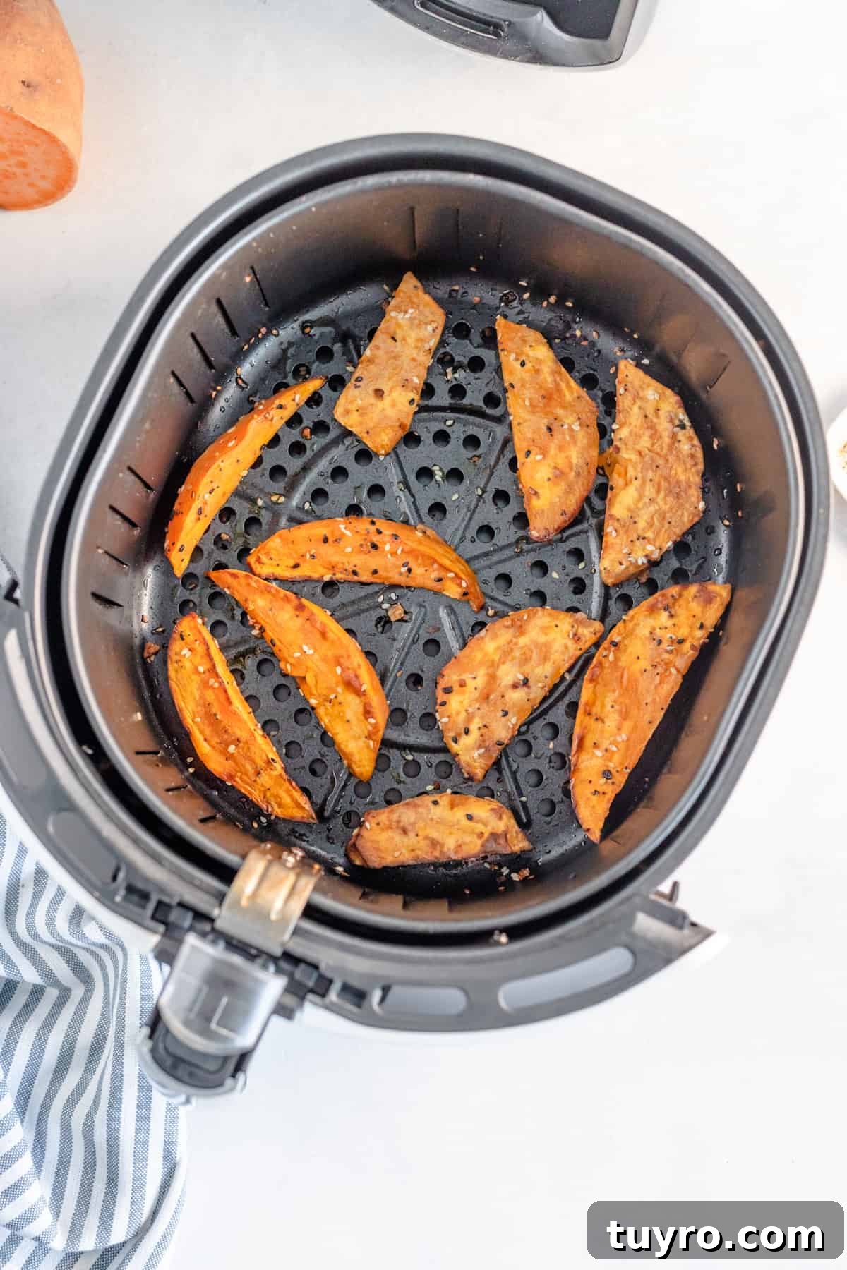 Crispy Air Fryer Sweet Potato Wedges Recipe 5 Air fryer sweet potato wedges cooked and ready to serve.