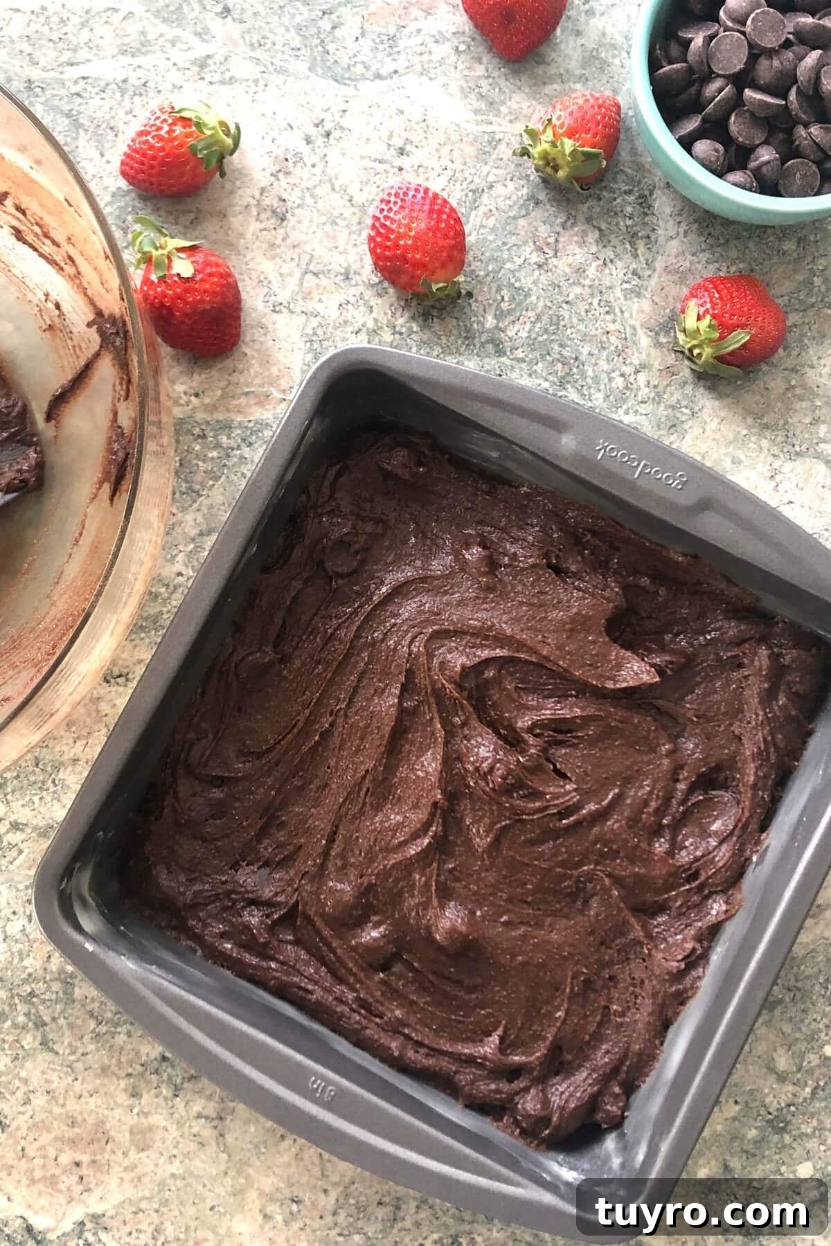 Brownie batter in a pan.