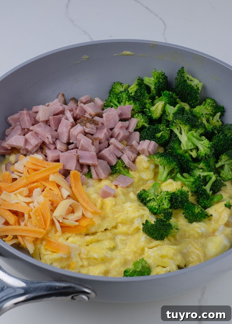 Ham, Broccoli and Cheddar Breakfast Scramble 10 Close up of ham and broccoli scramble