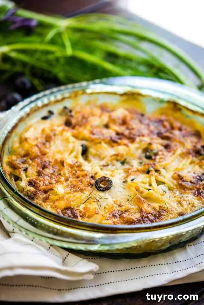 Au Gratin Potatoes with Fennel and California Ripe Olives 3 Glass Dish with potatoes au gratin inside