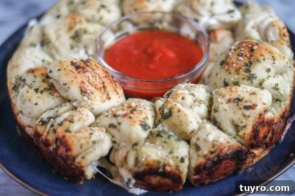Pull-Apart Pesto Pizza Bread Recipe 3 Assembling pesto-coated dough balls