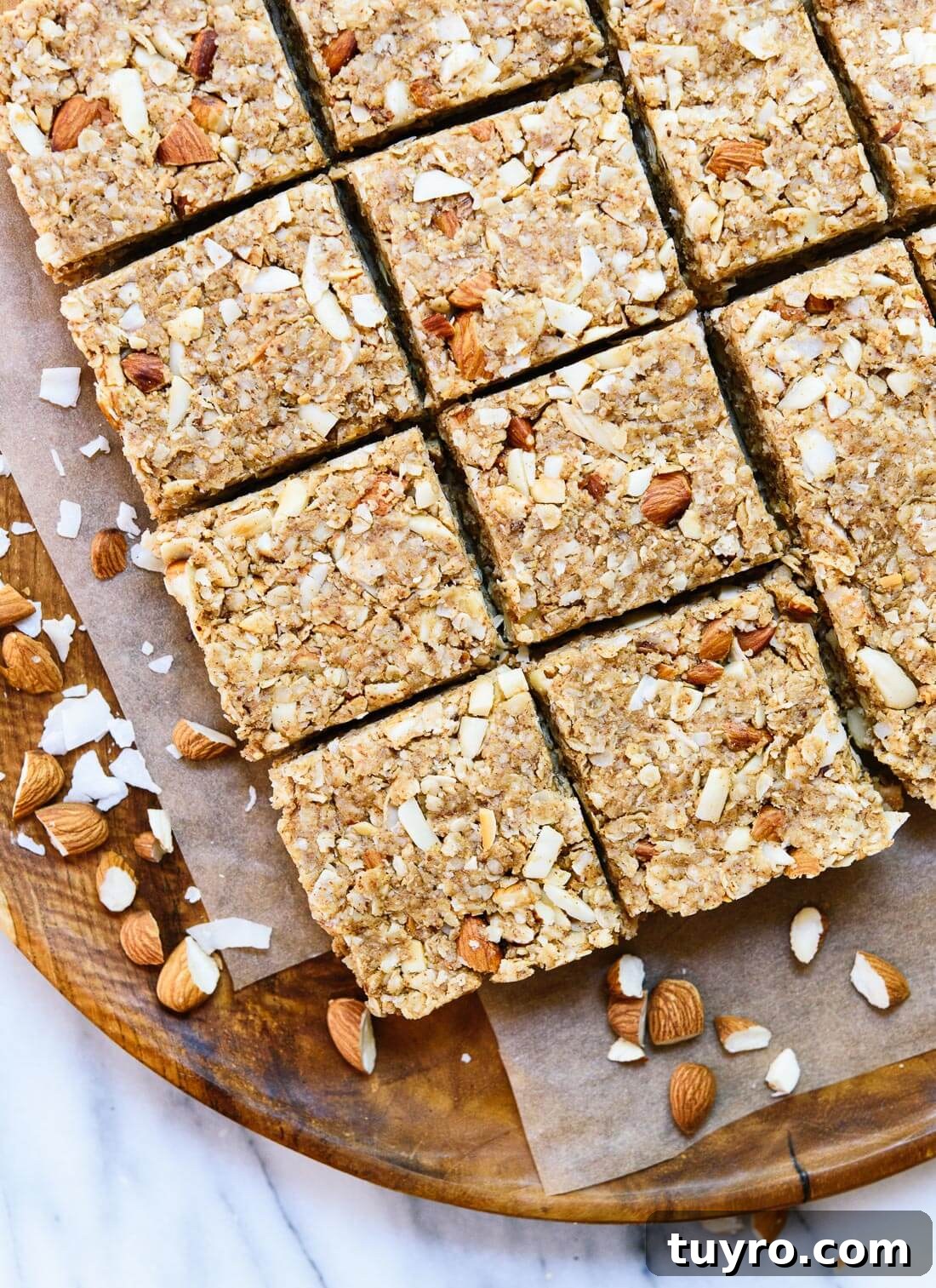 No Bake Almond Coconut Granola Bars Recipe 2 Healthy homemade almond coconut granola bars that taste amazing! cookieandkate.com