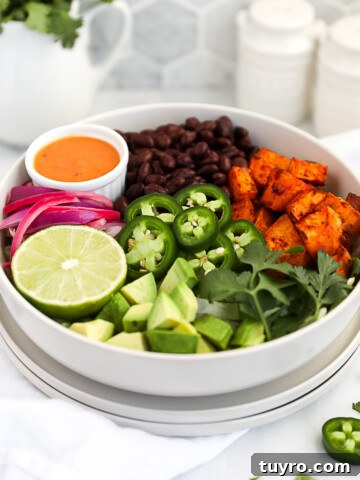 A white bowl filled with plant based taco ingredients