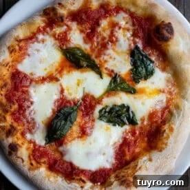 Classic Margherita Pizza Recipe with Fresh Basil 4 Cooked Margherita Pizza