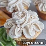 up close picture of gluten free churro cupcakes.