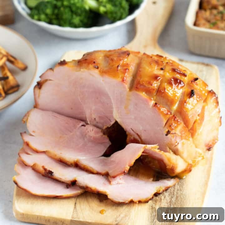 Honey roast gammon on a serving board.