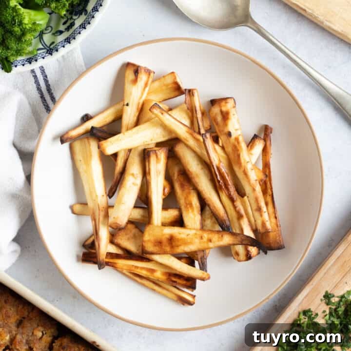 Air fryer parsnips on a plate.