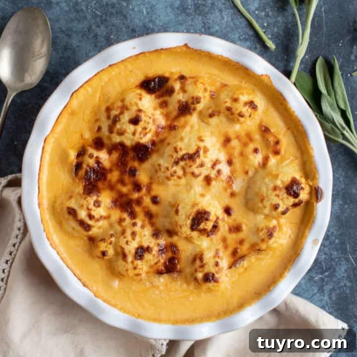 Cauliflower cheese in a baking dish.