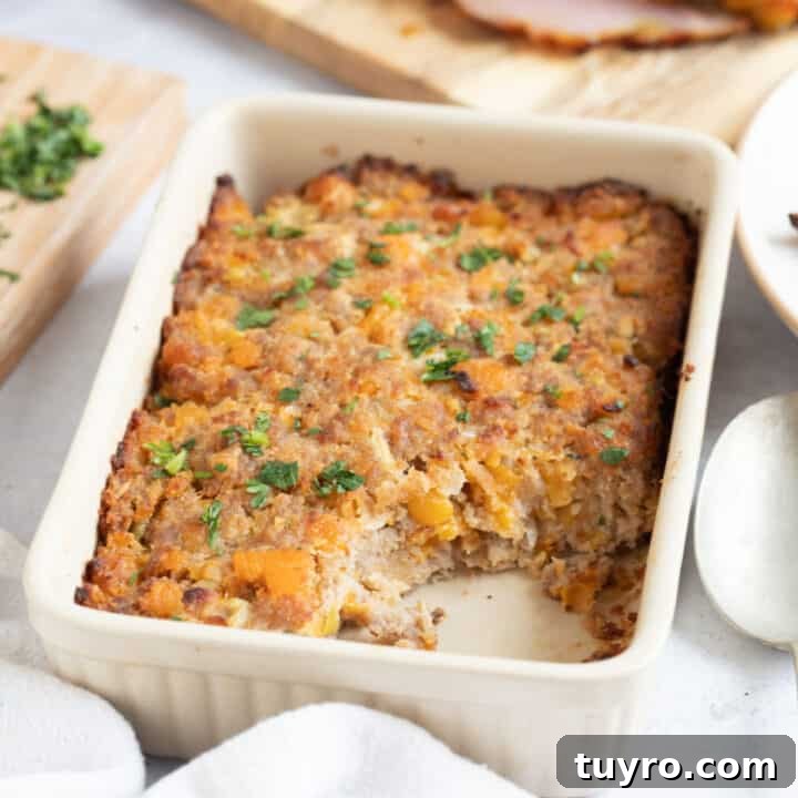 Apricot and sausage meat stuffing in a dish.