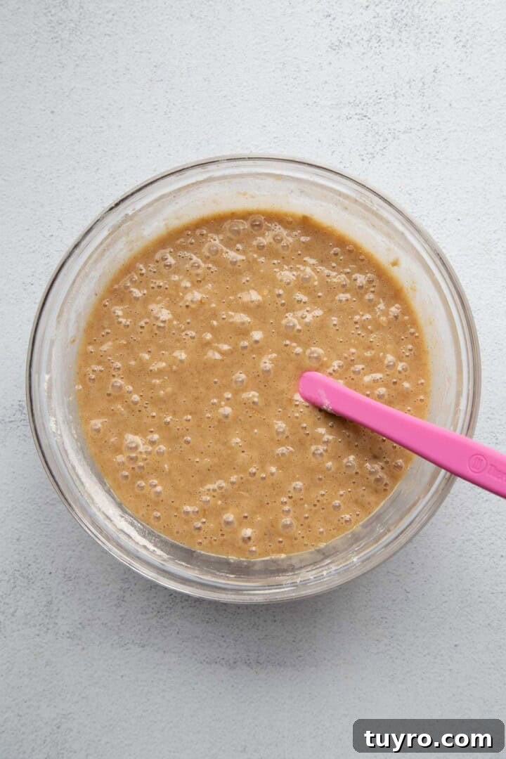 Classic Lazy Daisy Oatmeal Cake Recipe 6 oatmeal cake batter in a glass bowl