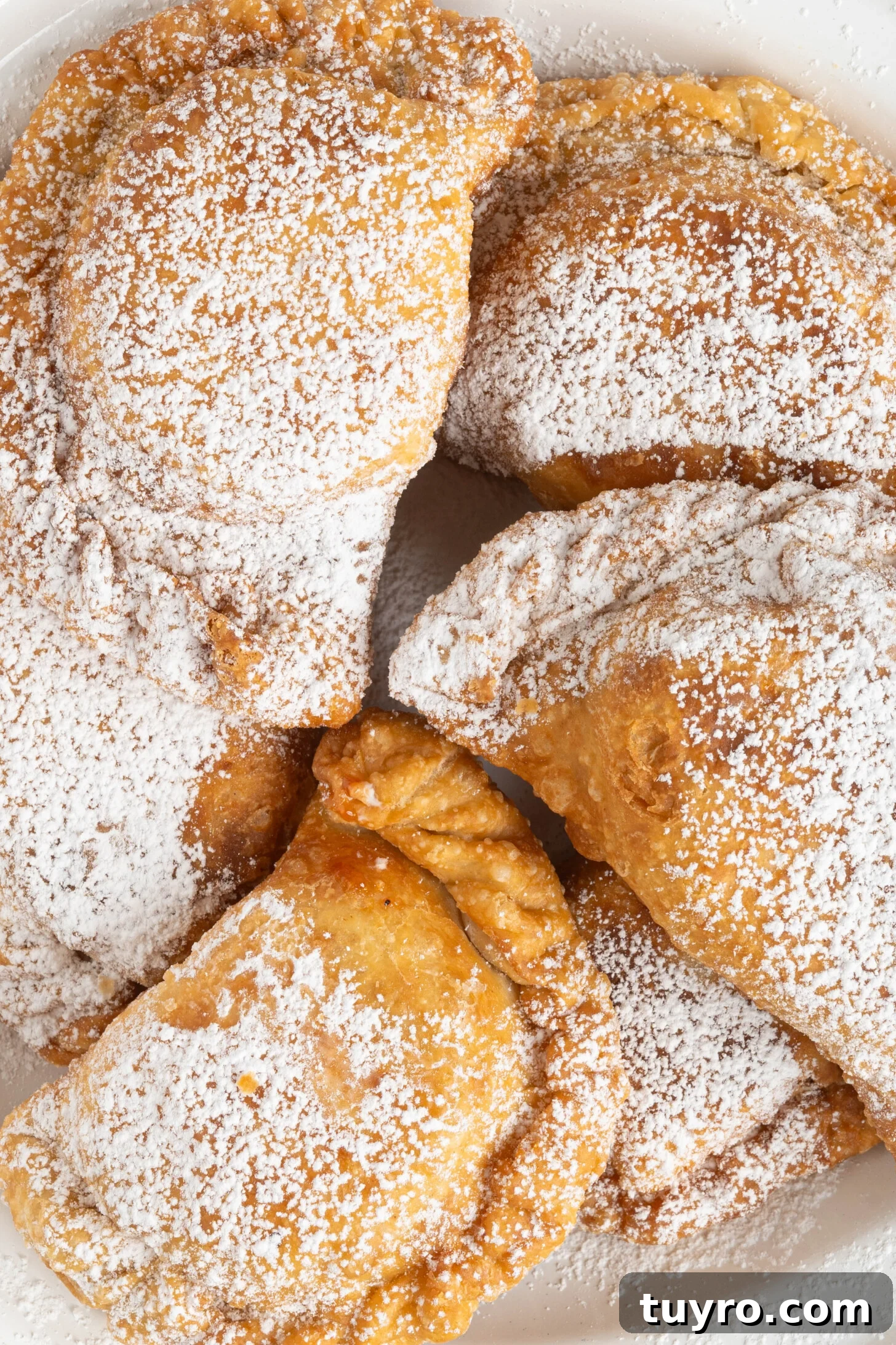 Guava Cheese Empanadas with 5 Ingredients — Quick Sweet Treat 17 guava cheese empanadas on a plate