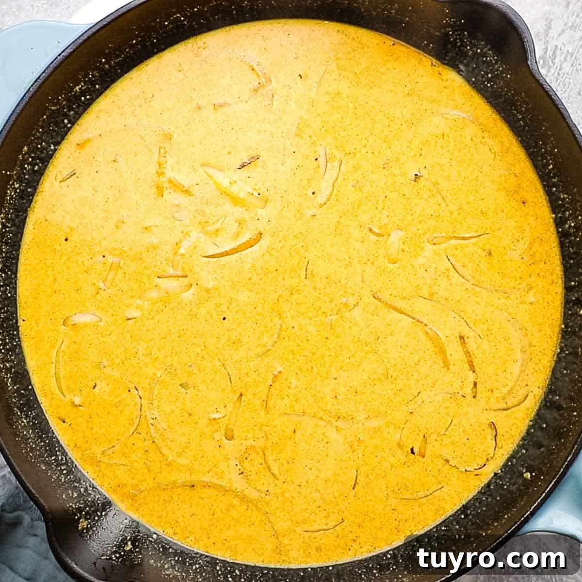 Chicken and Potato Curry Recipe 13 curry being cooked on a skillet