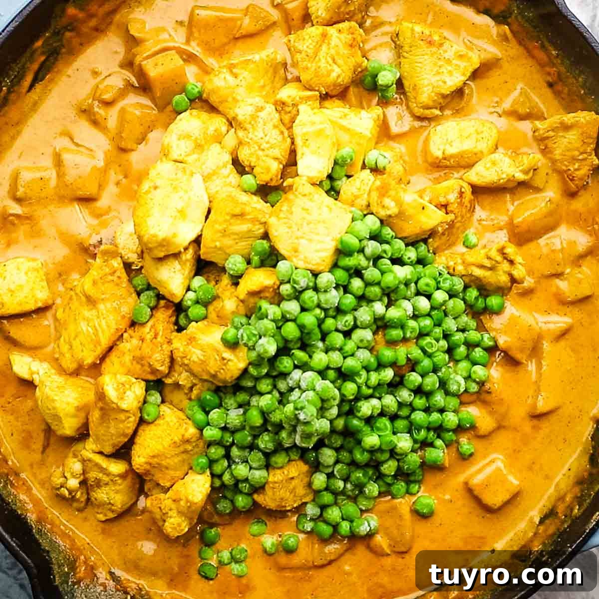Chicken and Potato Curry Recipe 15 chicken and peas added to the skillet
