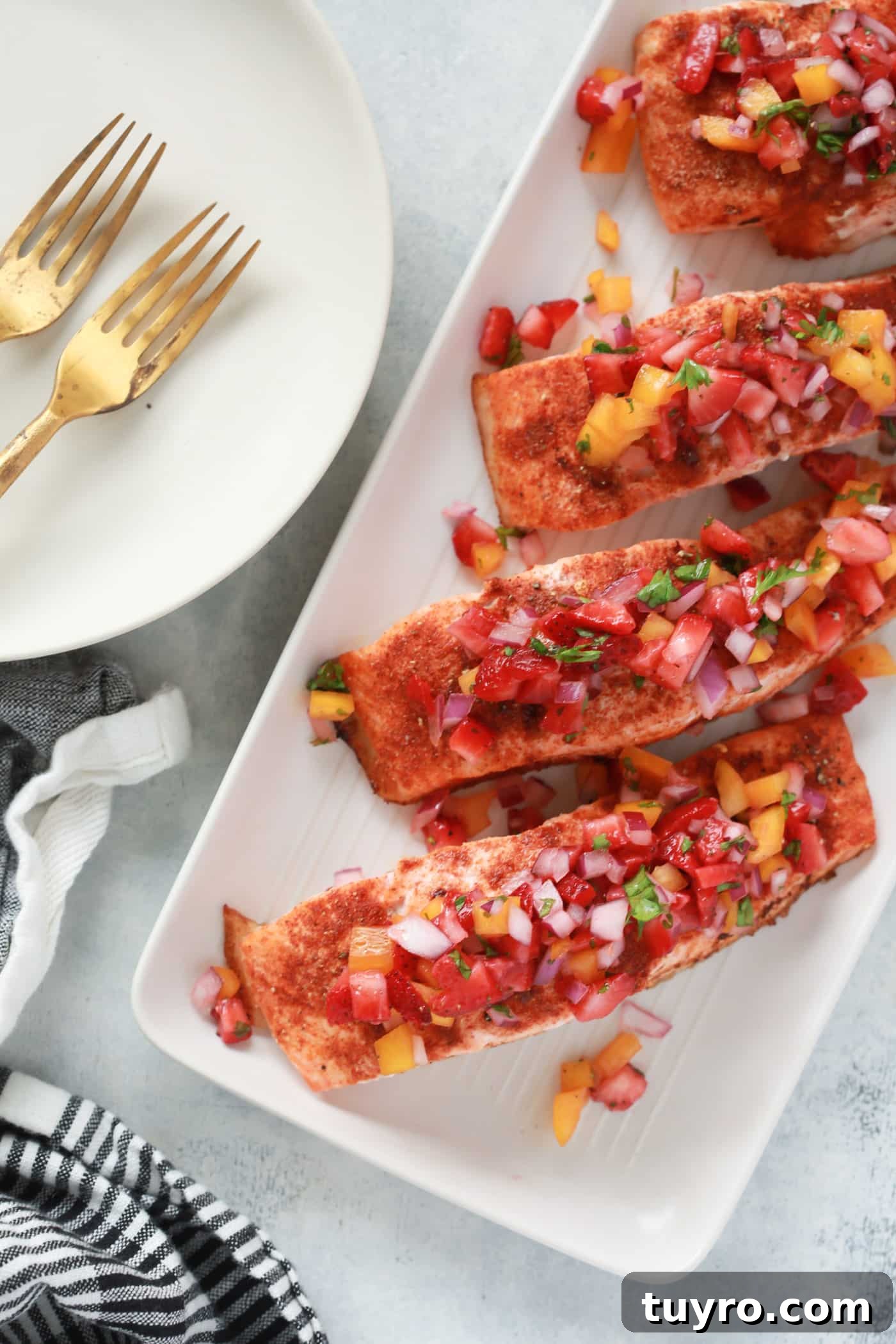 This Cajun Salmon with Strawberry Salsa is a perfect summer lunch or light dinner to enjoy during the week. It's easy to make, gluten-free, low-carb and paleo-friendly.