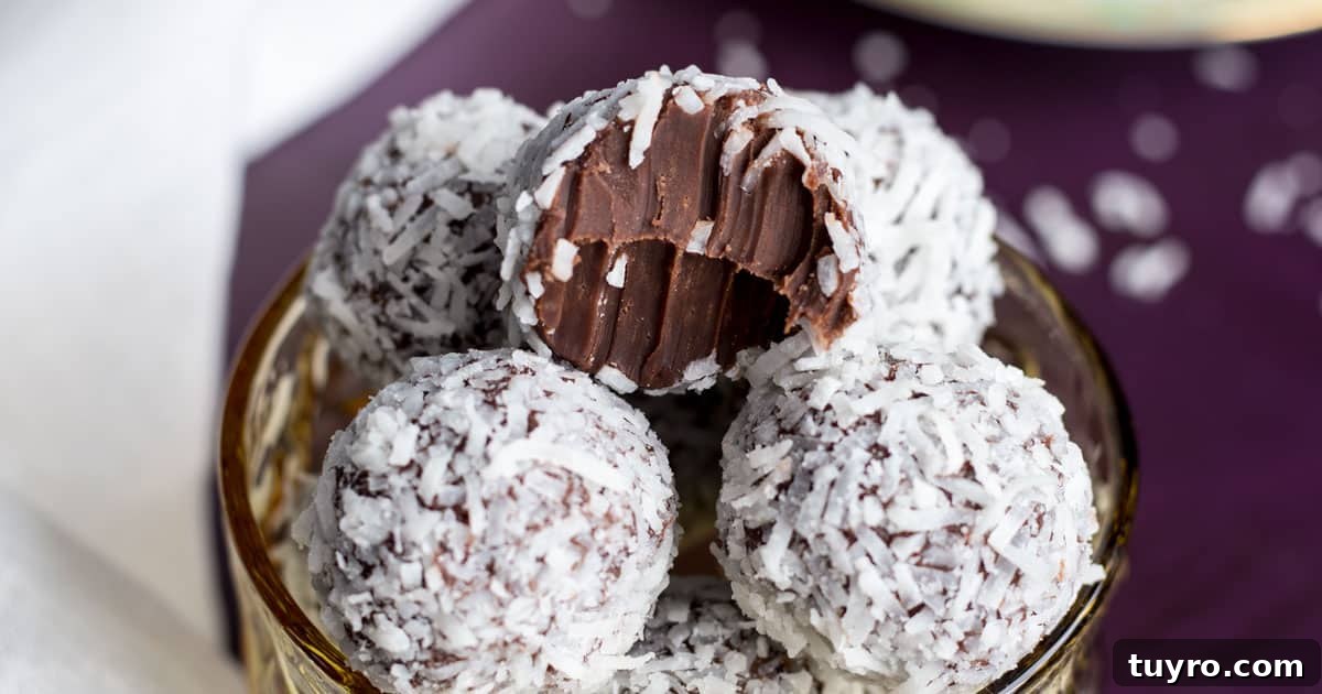 Coconut truffles piled in a glass cup